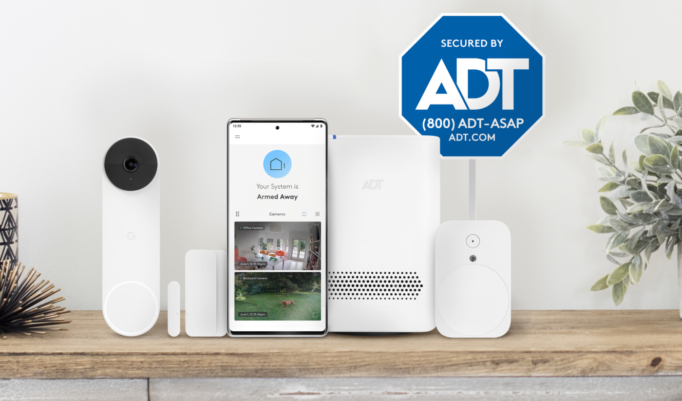 ADT self setup package with a doorbell, cellphone showing the app, hub, yard sign and more