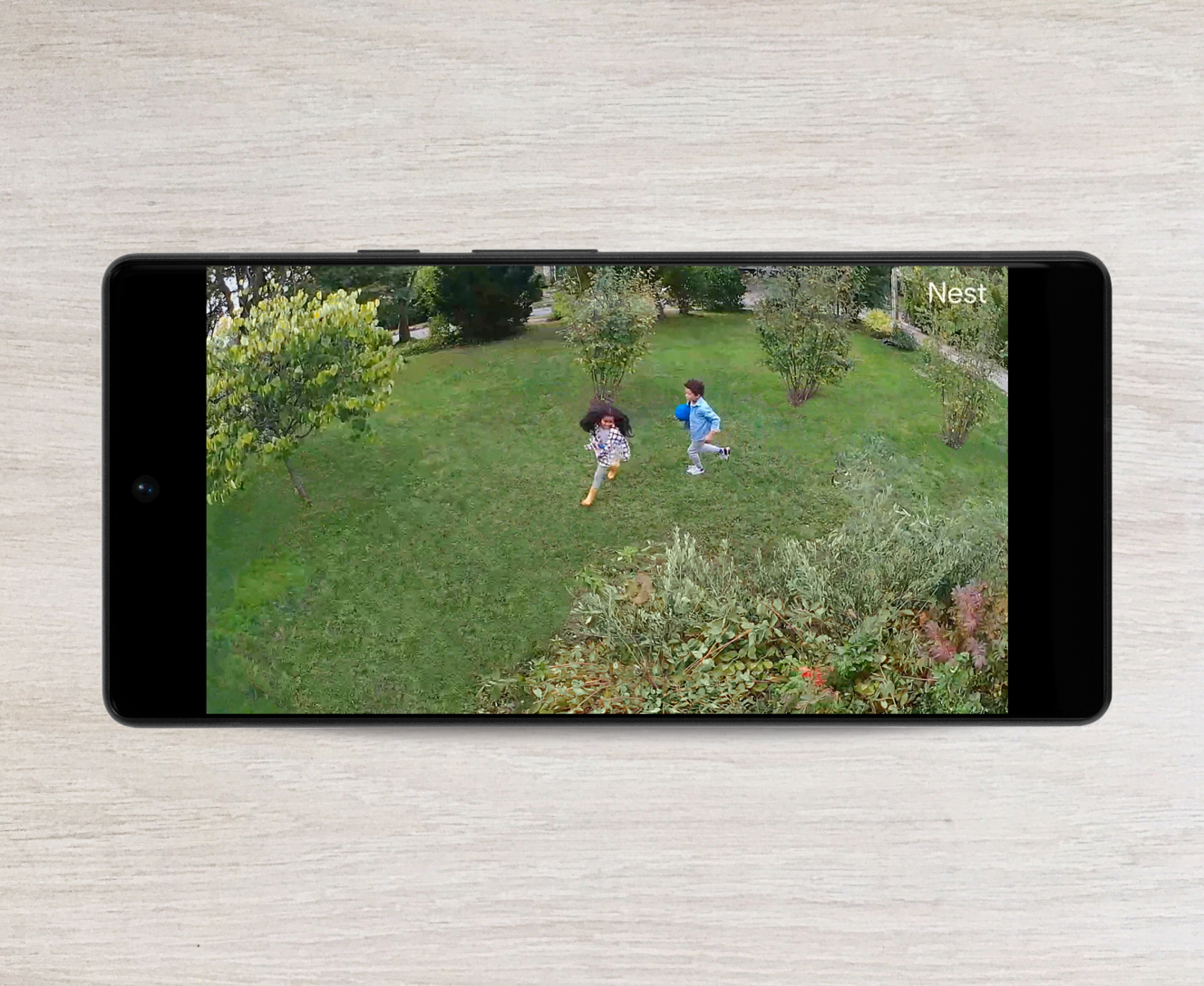 Video surveillance on a cellphone from the Google Nest Cam with floodlight