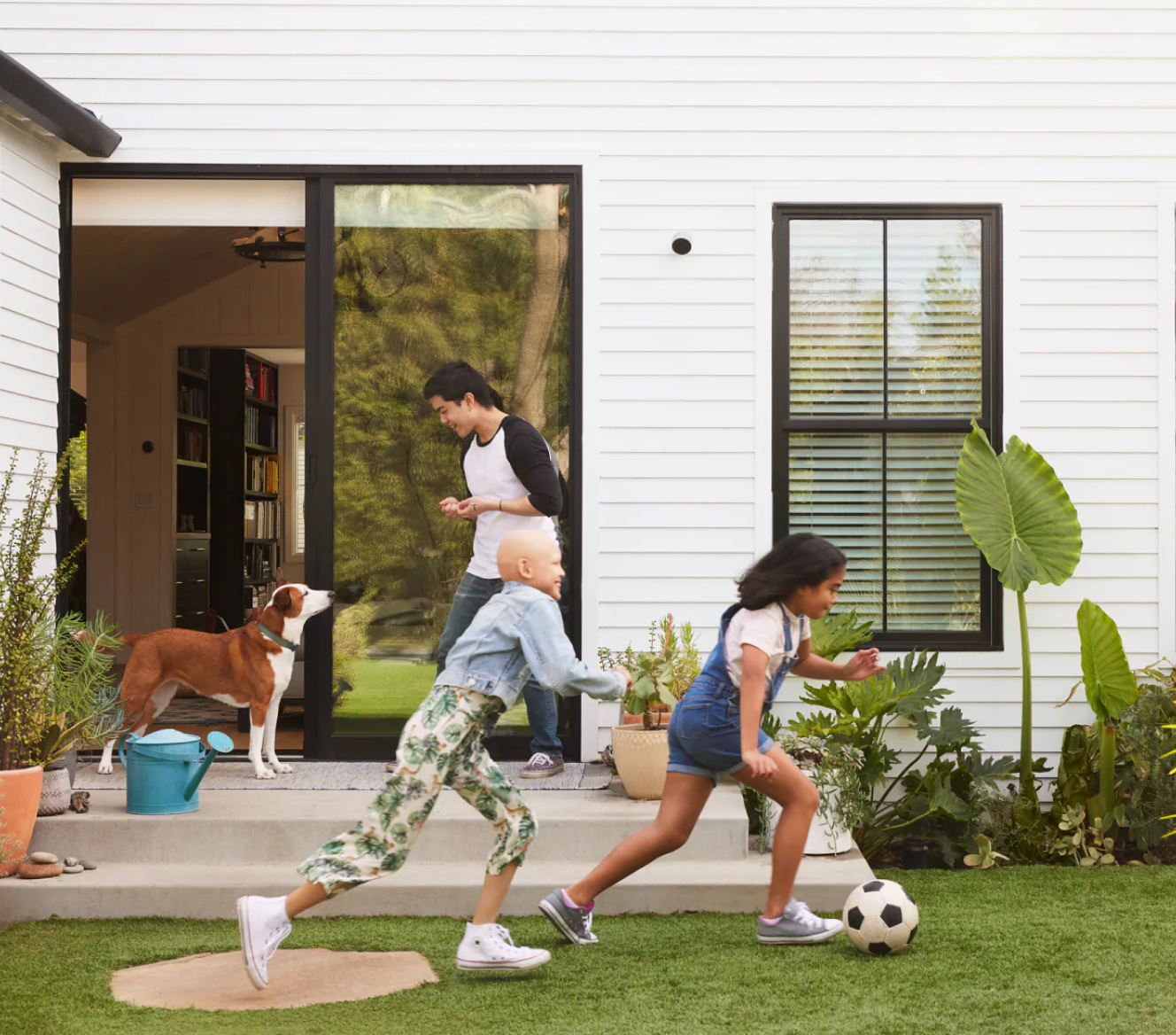 Google Nest Cam outside of a home where children play soccer