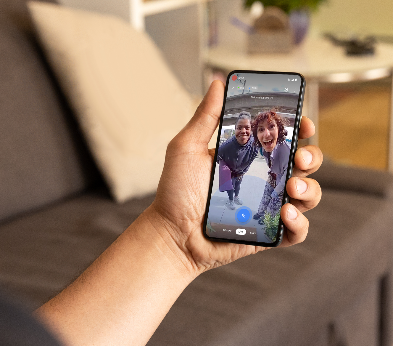 A phone displaying the video footage on their phone of the Google Nest Doorbell