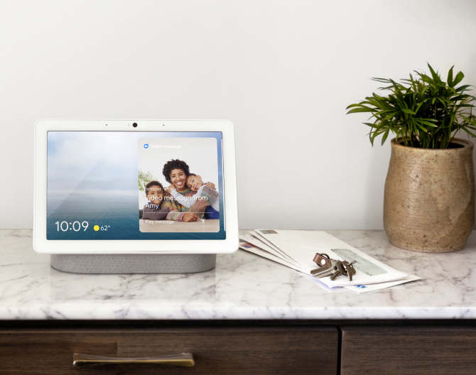 Google Nest Hub Max showing the home screen on a countertop 